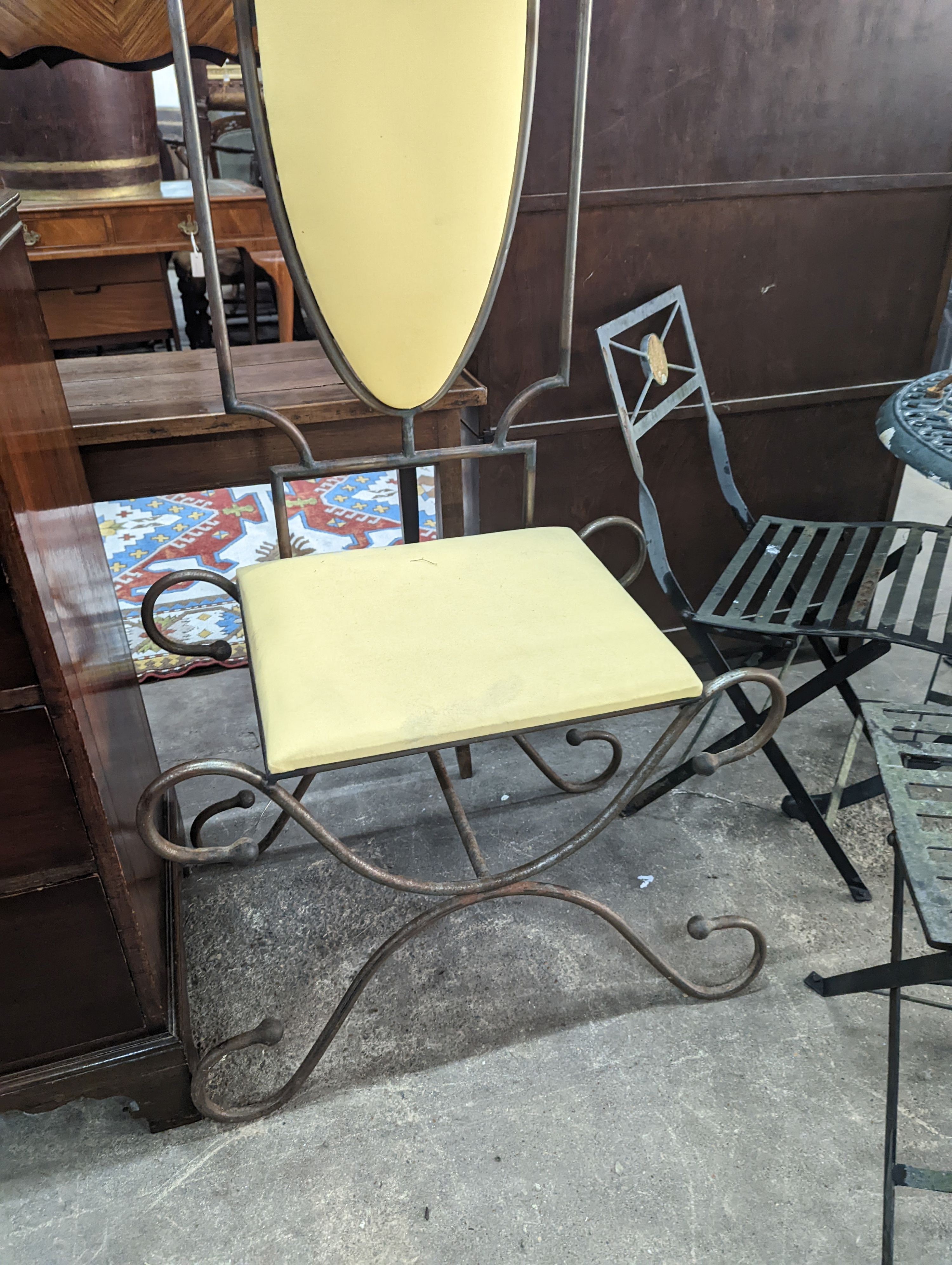 A wrought iron high back chair, height 172cm